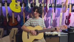 Mustafa with his acoustic guitar